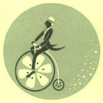 MAN RIDING BICYCLE, THE WHEELS OF WHICH ARE MADE OF FRUIT SLICES