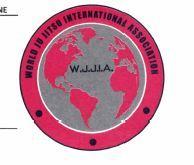 World Ju Jitsu International Association - Logo circolare con all interno raffigurato il mondo rosso in uno sfondo grigio con all interno World Ju Jitsu International Association - Logo circolare con all interno raffigurato mondo rosso in uno sfondo grigio con all interno la dicitura W.J.J.I.A. circondato da un cerchio rosso con scritto world ju jitu international association World Ju Jitsu International Association - Logo circolare con all interno raffigurato il mondo rosso in uno sfondo grigio con all interno