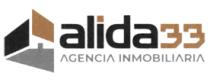 ALIDA33 SÍMBOLO CON 3 CUERPOS GEOMÉTICOS IRREGULARES EMULAN TERRENOS Y EN FIGURA- FONDO UNA FACHADA Y UN CAMINO DE ACCESO