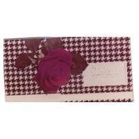 SUCHARD DE LUXE LABEL WITH RED ROSE ON BLACK AND WHITE TWEEDLIKE BACKGROUND DESIGN