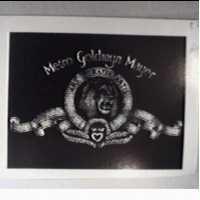 Metro Goldwyn Mayer ARS GRATIA ARTIS & device