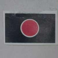 Red Dot with White Ring on Blue Background