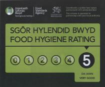 Asiantaeth Safonau Bwyd food.gov.uk/ratings Food Standards Agency Llwodraeth Cymru Welsh Government Gweithredir y cynllun hwn mewn partneriaeth â'ch awdurdod lleol This scheme is operated in partnership with your local authority SGÔR HYLENDID BWYD FOOD HY